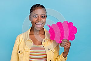 Portrait of attractive girl holding pink card copy space saying info isolated over bright blue color background
