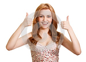 Portrait of attractive girl showing thumbs up sign