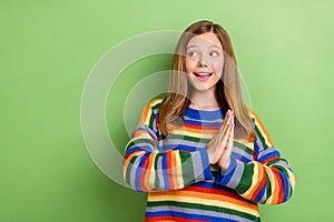 Portrait of attractive girly cheeful girl waiting anticipation copy space isolated over bright green color background