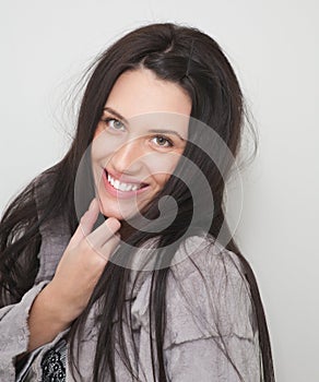 Portrait of attractive happy girl in fur