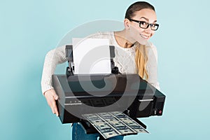 Attractive woman printing cash photo