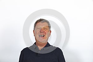 Portrait of attractive laughing mature man