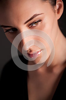 Portrait of attractive melancholic brunette girl