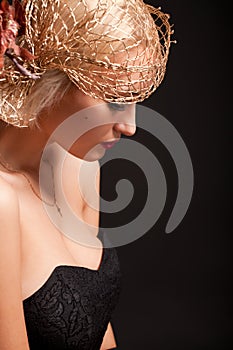 Portrait of attractive retro-style woman in bonnet