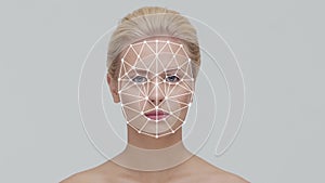 Portrait of attractive woman with a scnanning grid on her face.