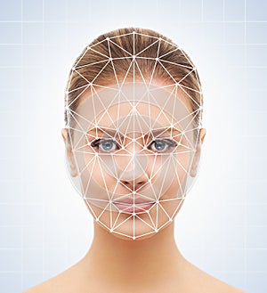 Portrait of attractive woman with a scnanning grid on her face. Face id, security, facial recognition.