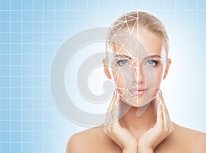 Portrait of attractive woman with a scnanning grid on her face. Face id, security, facial recognition, future technology