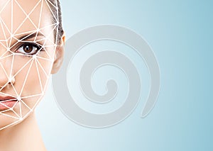 Portrait of attractive woman with a scnanning grid on her face. Face id, security, facial recognition, future technology