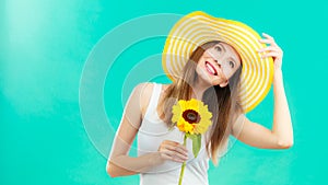 Portrait attractive woman with sunflower