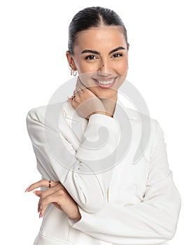 portrait of attractive young businesswoman holding hand on neck