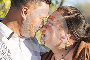 Portrait of an attractive young Maori couple staring into each others eyes