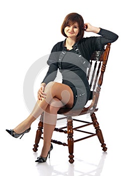 Portrait of attractive young sitting girl