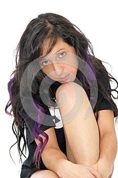 Portrait of attractive young woman posing in studio