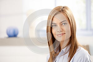 Portrait of attractive young woman smiling