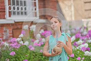 Portrait of attractive young woman traveler drinking coconut juice walking on downtown street. lifestyle concept