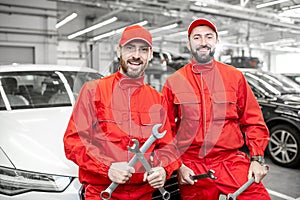 Portrait of auto mechanics at the car service