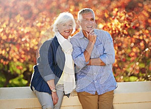 Portrait, autumn and senior couple together in nature, park or vineyard or happy, marriage in retirement or thinking