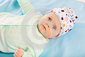 Portrait of a baby in a cap