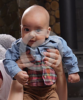 Portrait of a baby infant boy being hold