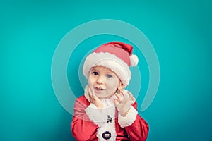 Portrait of baby wearing Santa Claus costume