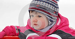 Portrait of baby in winter time