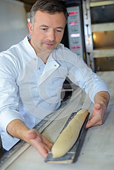 portrait baker with baguette