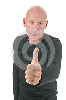 Portrait bald man with thumbs up