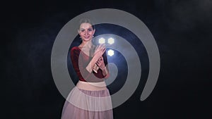 The portrait of the ballerina with pointe shoes. Close-up. HD.