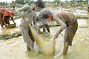 Portrait of Bangladeshi boys working in gravel pit