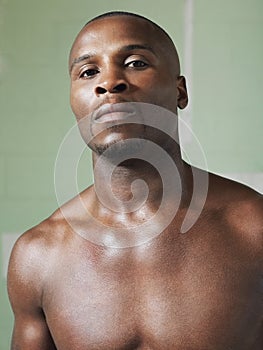 Portrait Of Bare Chested African American Boxer photo