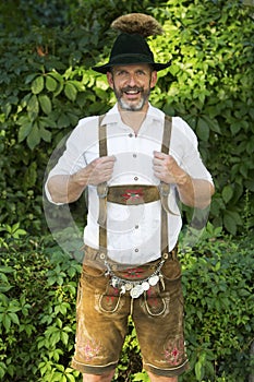 Portrait of bavarian man in lederhosen