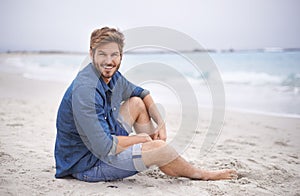 Portrait, beach and man with a smile, travel and summer holiday with weekend break and water. Waves, face and person