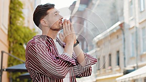 Portrait of bearded man praying closed eyes to God asking for blessing help forgiveness outdoors