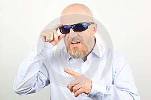 Portrait of a bearded man wearing sunglasses