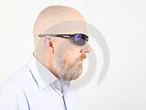 Portrait of a bearded man wearing sunglasses