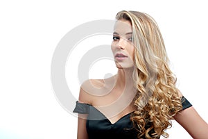 Portrait of a beatiful girl with blonde hair on the white background