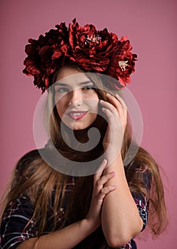 portrait of a beatiful girl with a wreath in studio