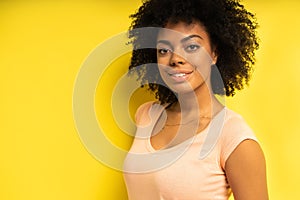 Portrait of beautiful african american female model smiling.