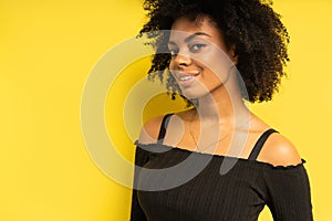 Portrait of beautiful african american female model smiling.