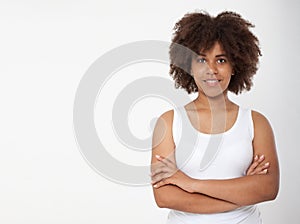 Portrait of beautiful african american female model smiling isolated on white. Atractive brunette dark-skinned woman in