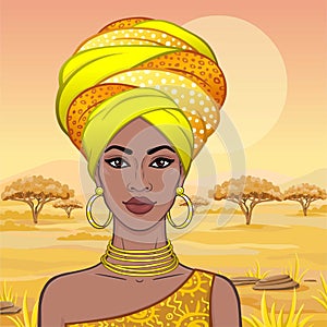 Portrait of the beautiful African woman in a turban.