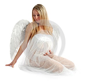 Portrait of a beautiful angelic pregnant woman