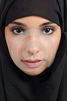 Portrait of a beautiful arab woman face with a black scarf