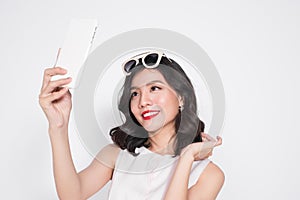 Portrait of beautiful asian fashionable girl taking selfie