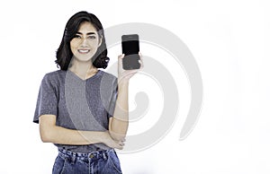 Portrait of beautiful Asian successful business girl celebrate with smartphone.