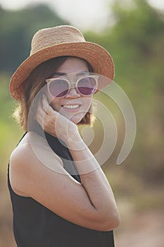 portrait of beautiful asian woman 50s years old toothy smiling with happiness on location