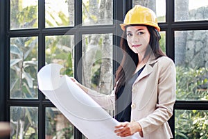 Portrait of beautiful Asian woman architect builder