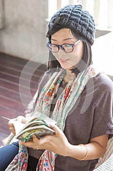 Portrait of beautiful asian woman relaxing time reading book on