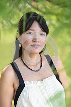 Portrait of beautiful asian woman smiling in park outdoor