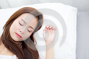 Portrait of beautiful asian young woman sleep lying in bed with head on pillow comfortable and happy with leisure.